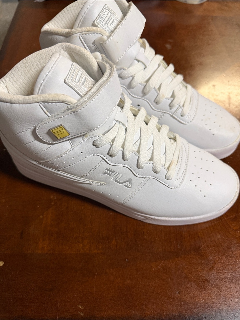 Fila White High-Top Leather Sneakers with Subtle Gold Accent